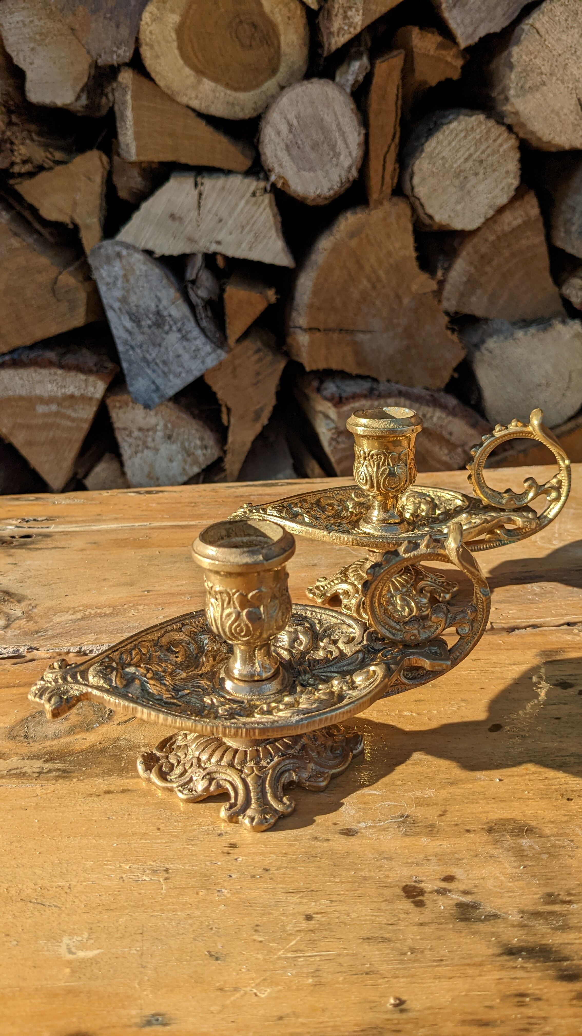 Pair of solid brass and arabesque candle holders