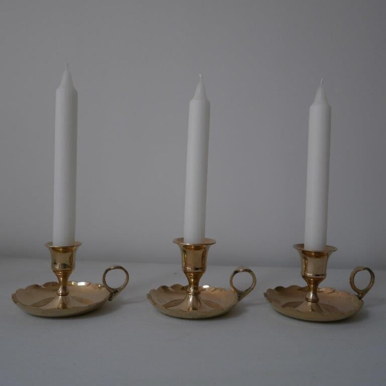 Brass candlesticks, cellar rat models