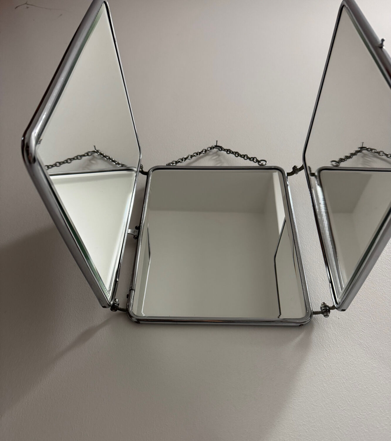 Bevelled triptych barber mirror from the 1950s.