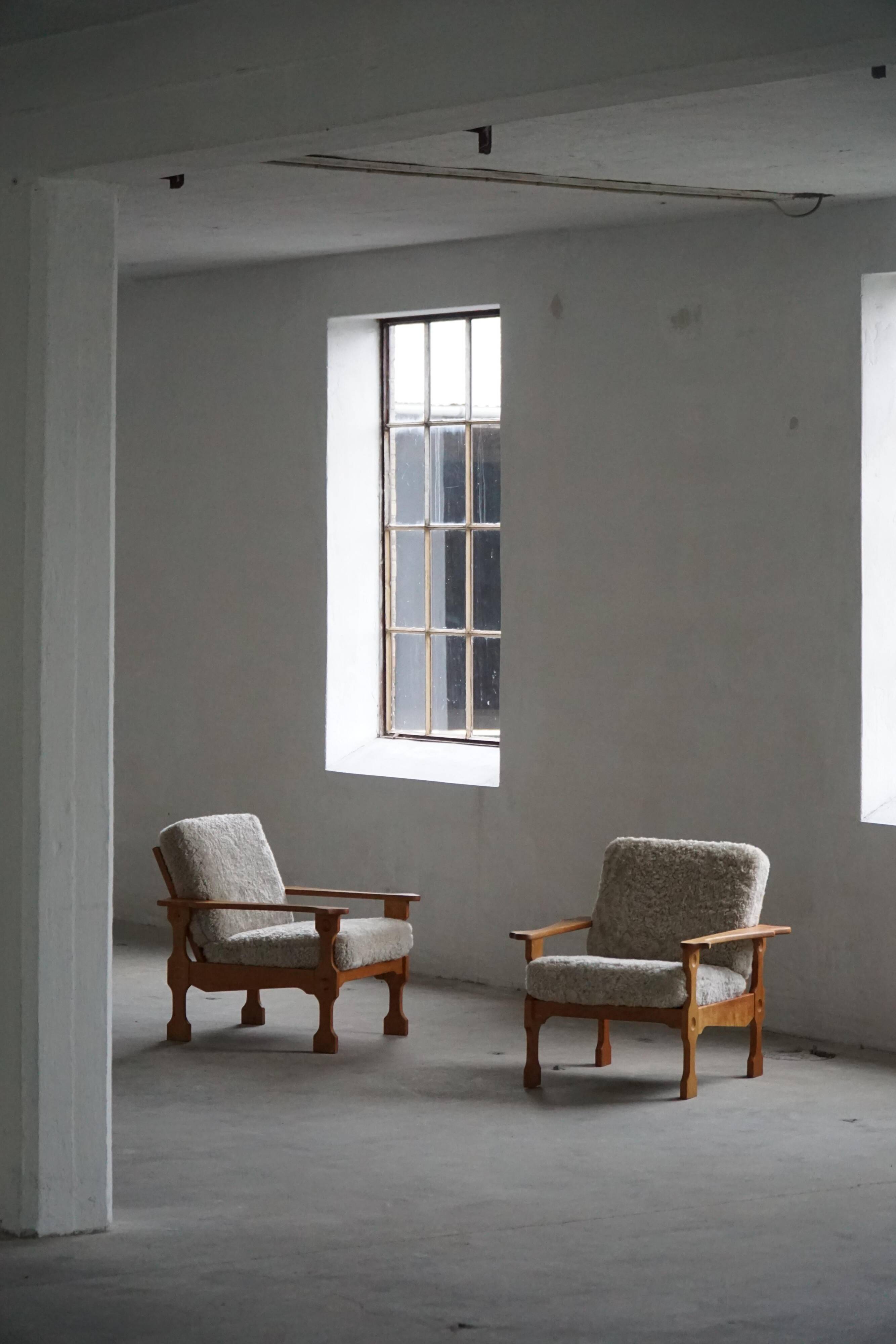 Modern Danish, Pair of Lounge Armchairs in Oak and Lambswool, Henning Kjærnulf, 1960s