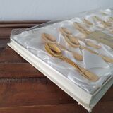 12 small spoonfuls a mocha in golden metal