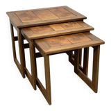 Set of 3 nesting tables in teak with tiled tops.