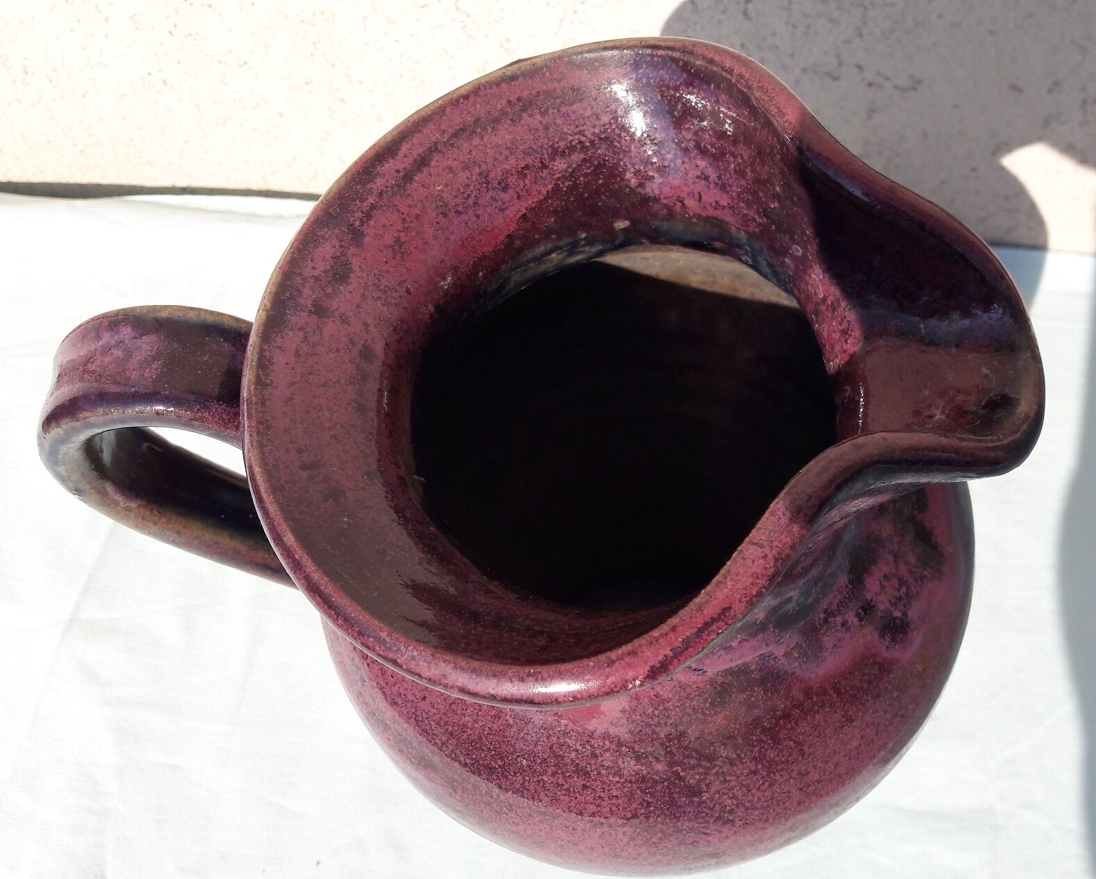 Signed ceramic pitcher