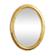 Golden oval mirror with leaf