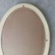 Miroir ovale vintage en bois patiné