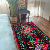 Vintage Romanian handwoven carpet with floral colorful design