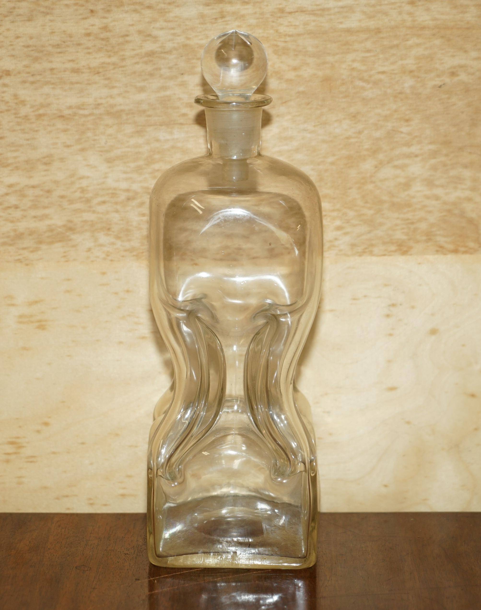 Pair of antique pinched decanters circa 1900 for serving whisky, bourbon, vodka, gin.