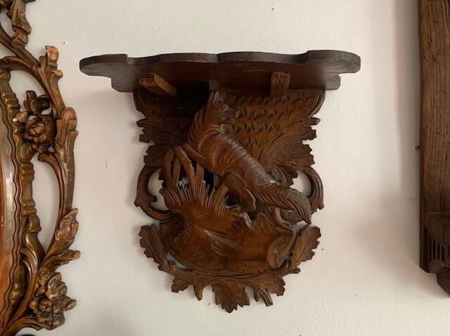 Black Forest carved wooden wall console, harness with wolf decoration