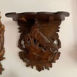 Black Forest carved wooden wall console, harness with wolf decoration