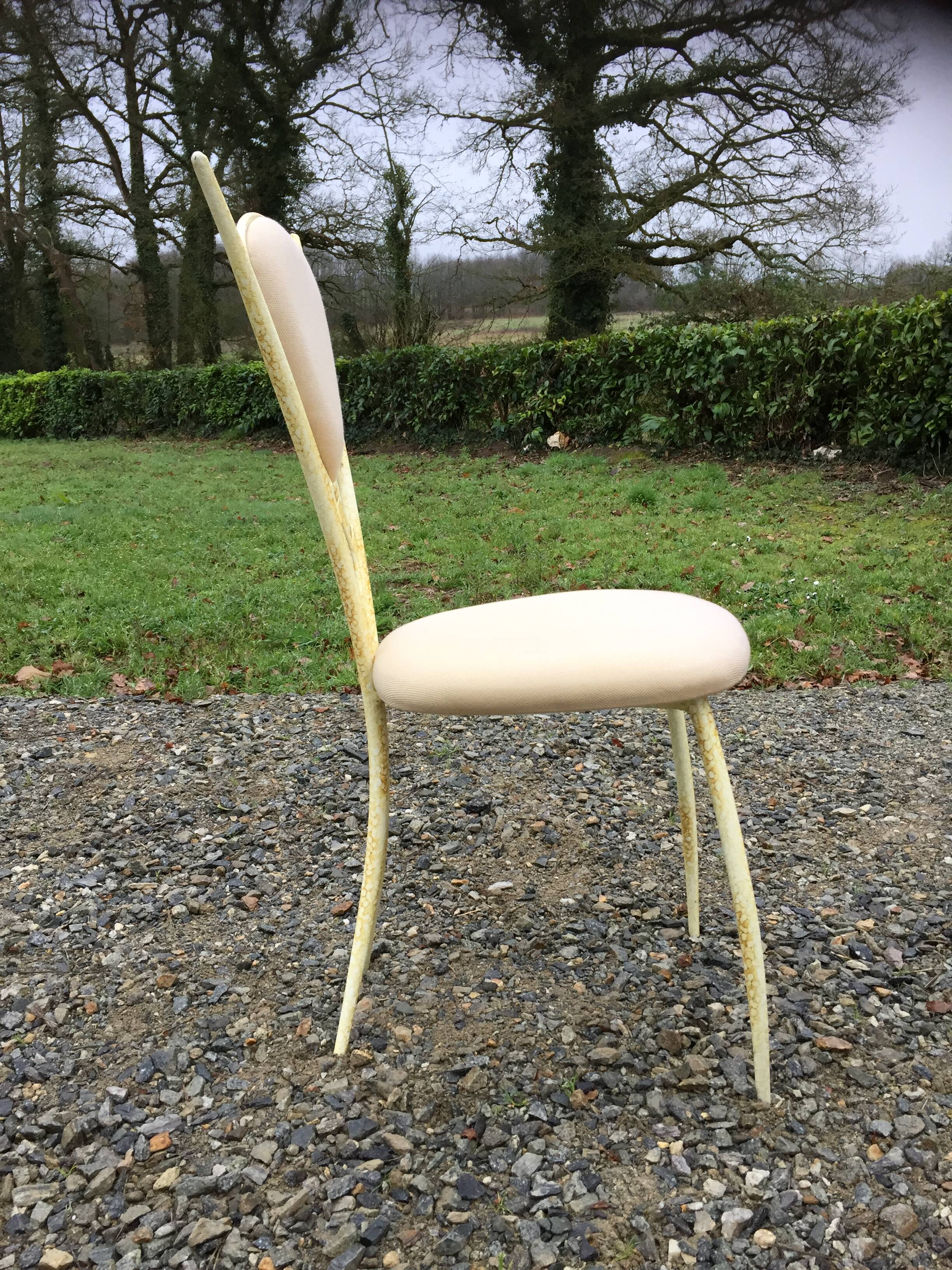 4 vintage chairs in tubular metal lacquered white yellow.