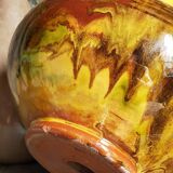 Old provencal pot cover in glazed terracotta