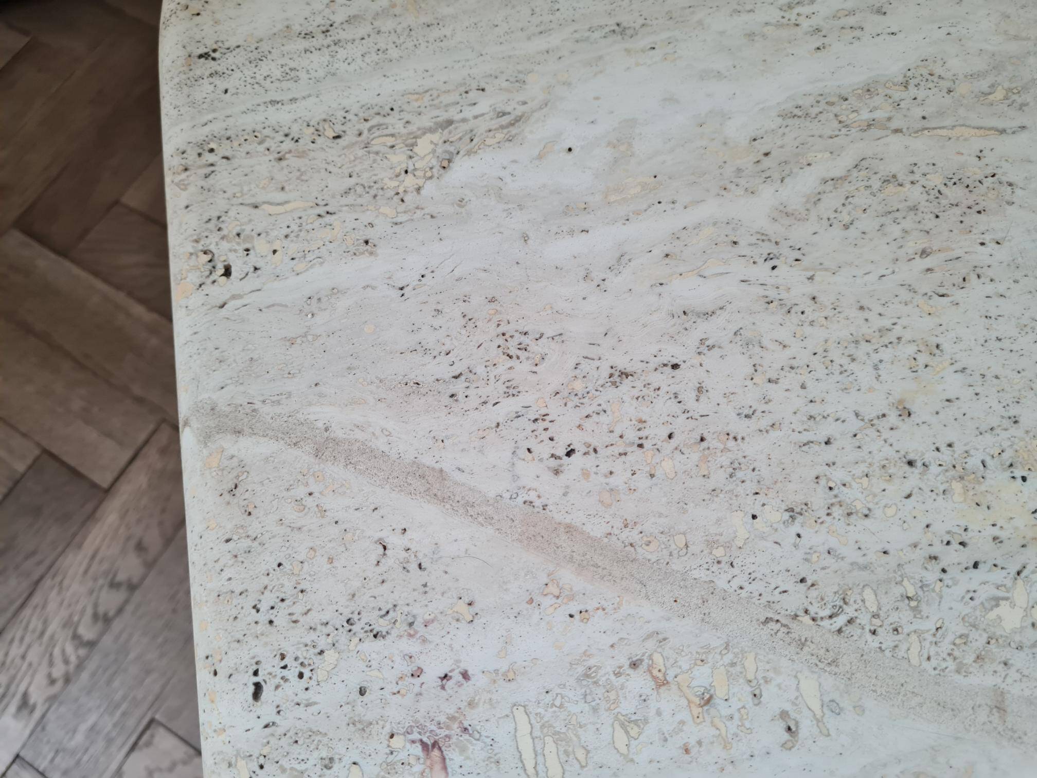 Pair of travertine nesting tables