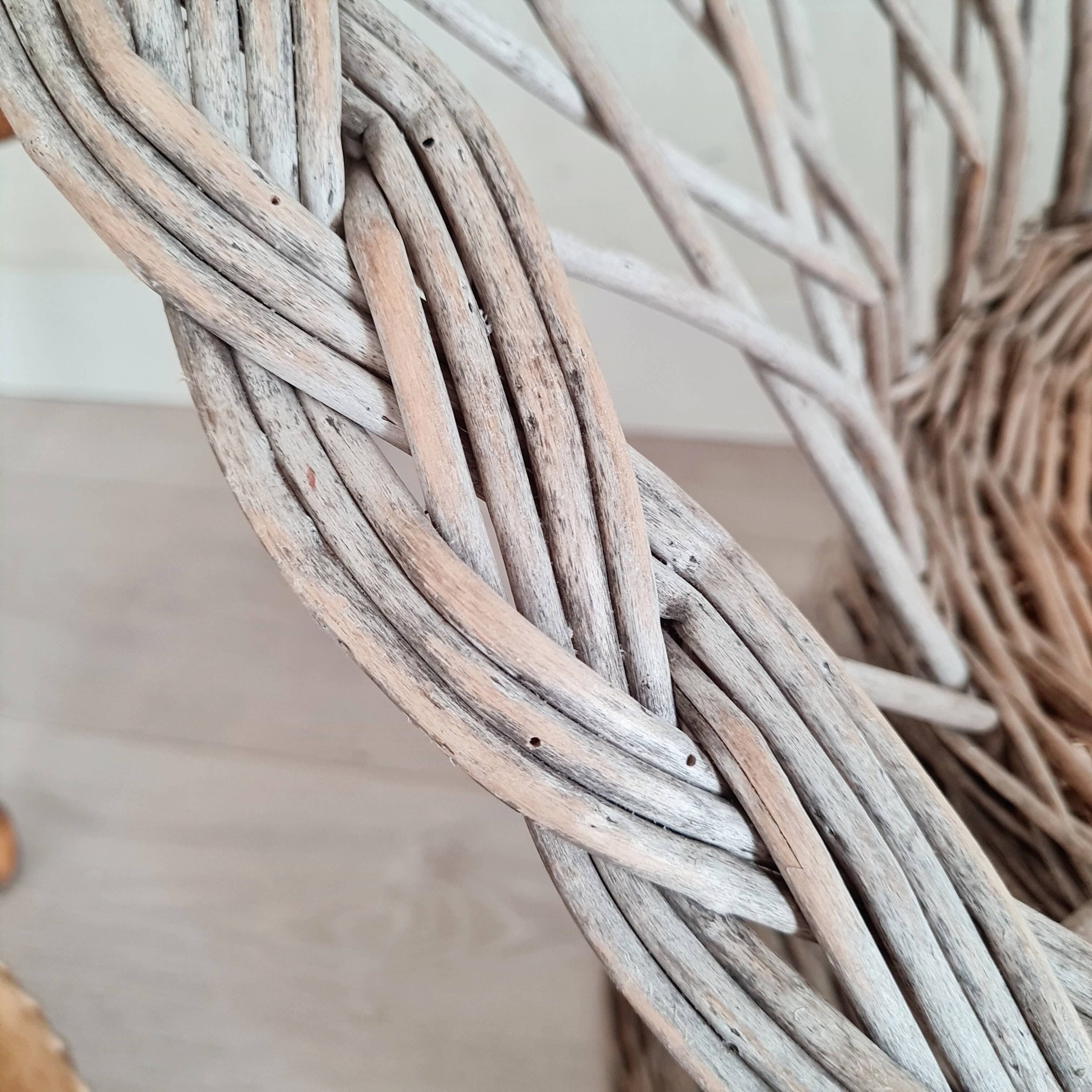 Antique armchair in gray woven wicker
