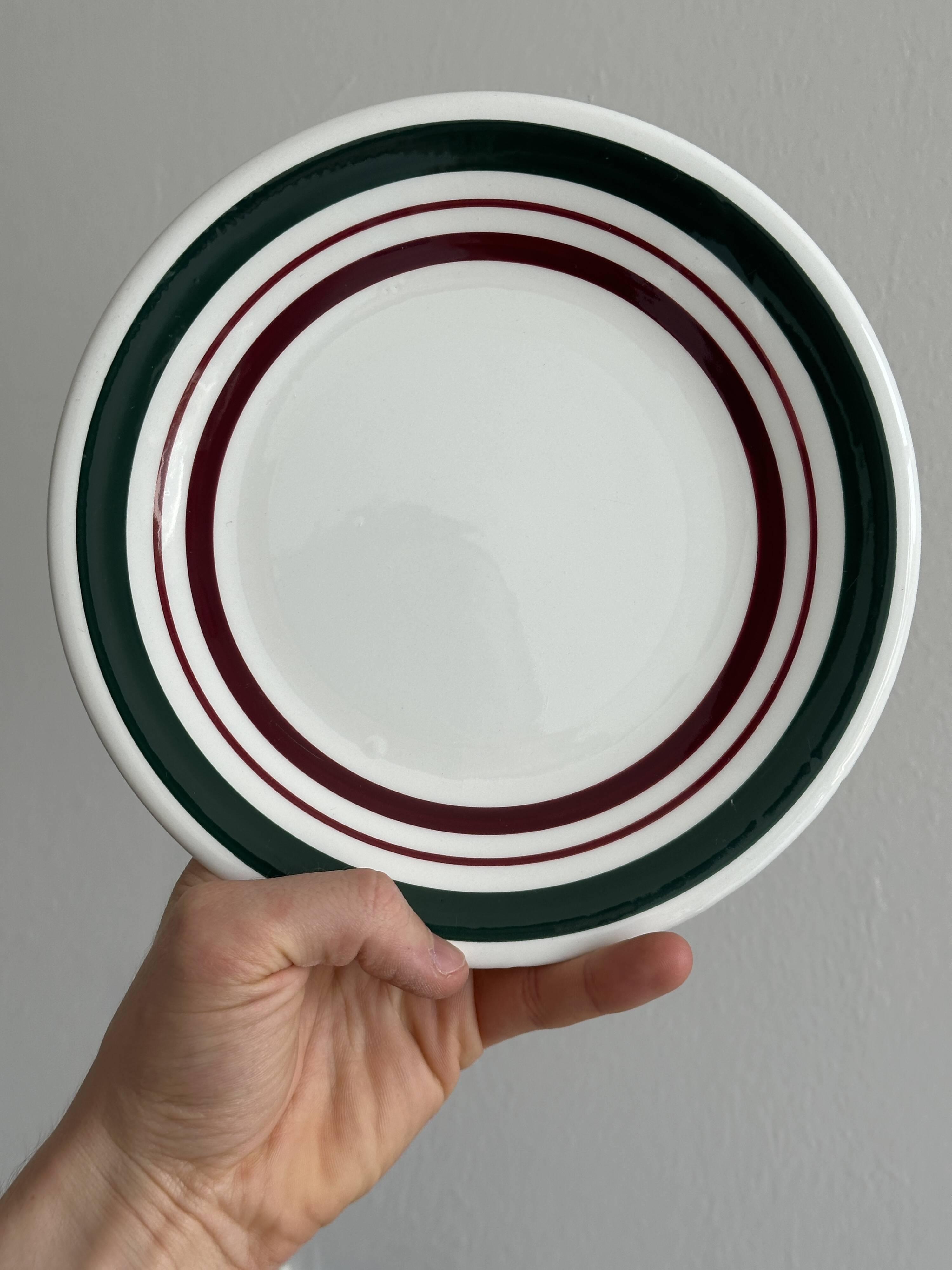 Duo of dessert plates with green and burgundy red border
