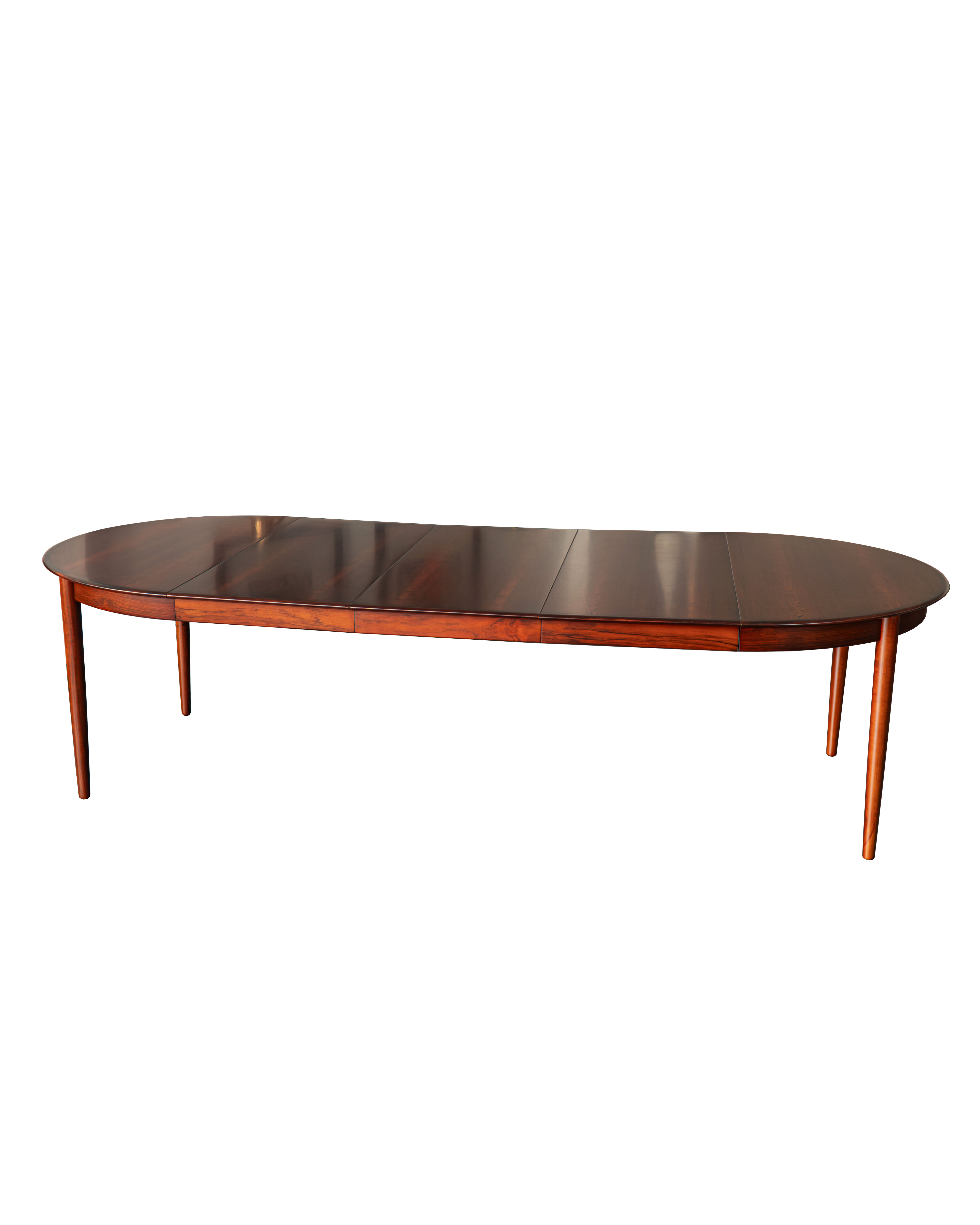Danish extendable rosewood dinning table by Skovby