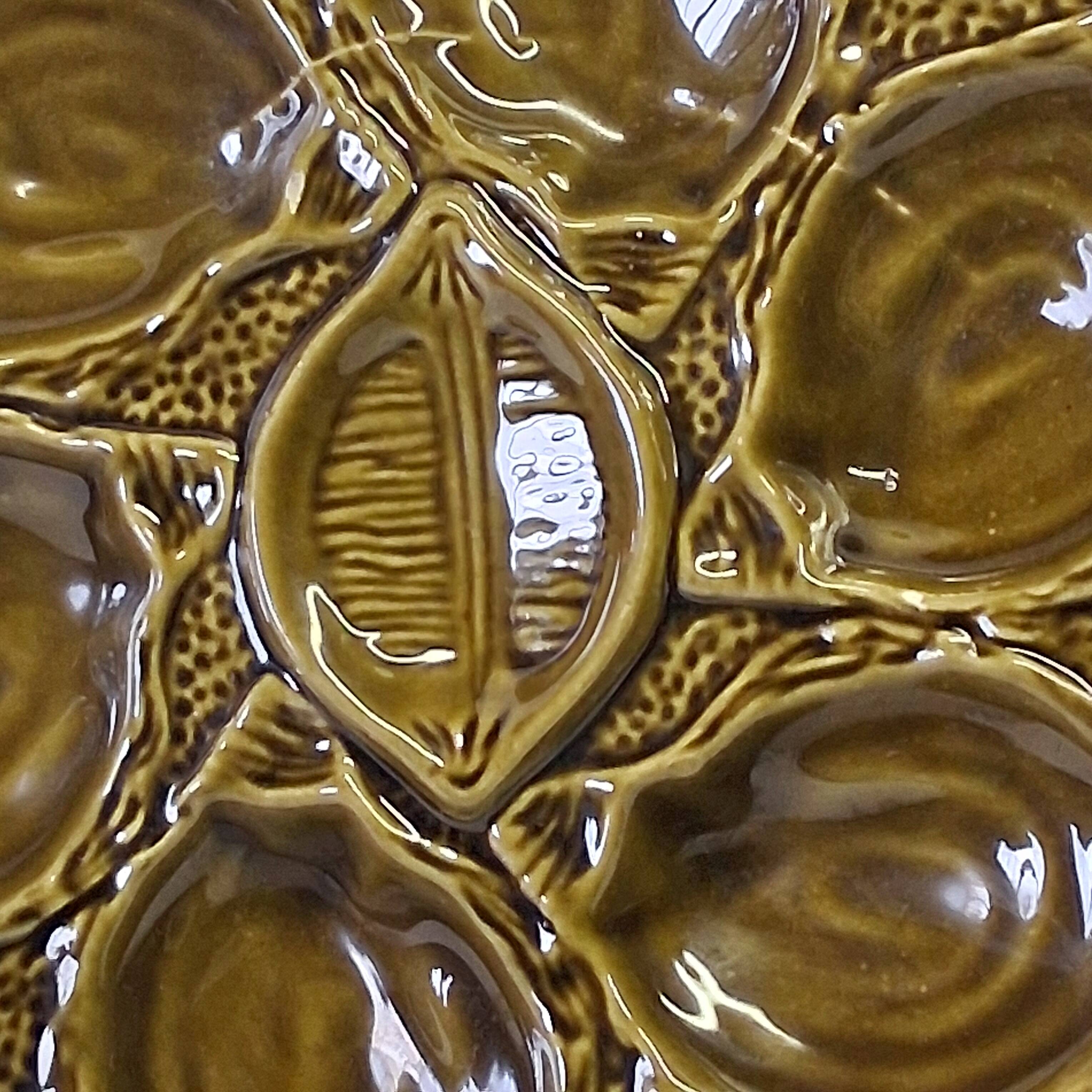 3 green majolica oyster plates from St Clément in good condition.