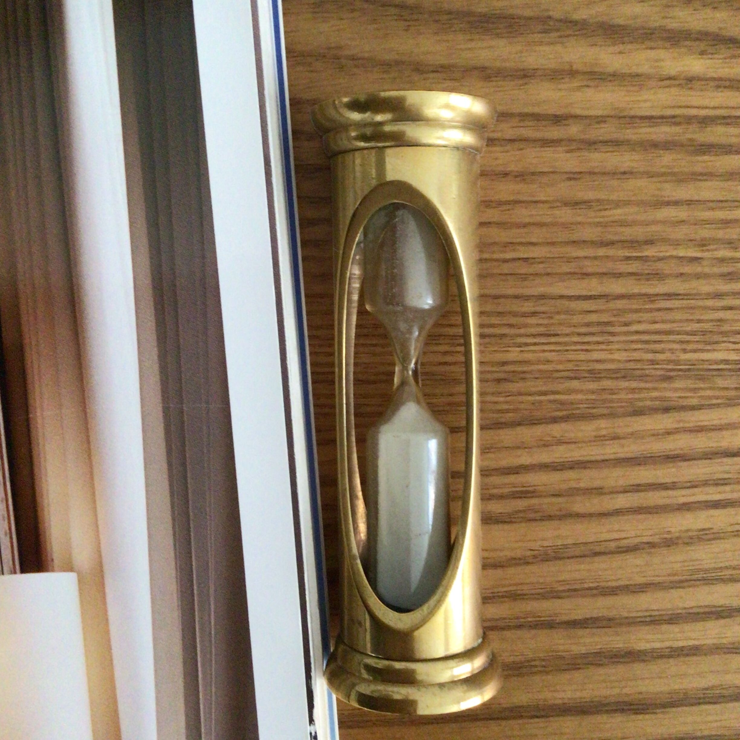 Old vintage golden hourglass
