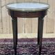Louis XVI style mahogany bouillotte table from the 1950s with a marble top