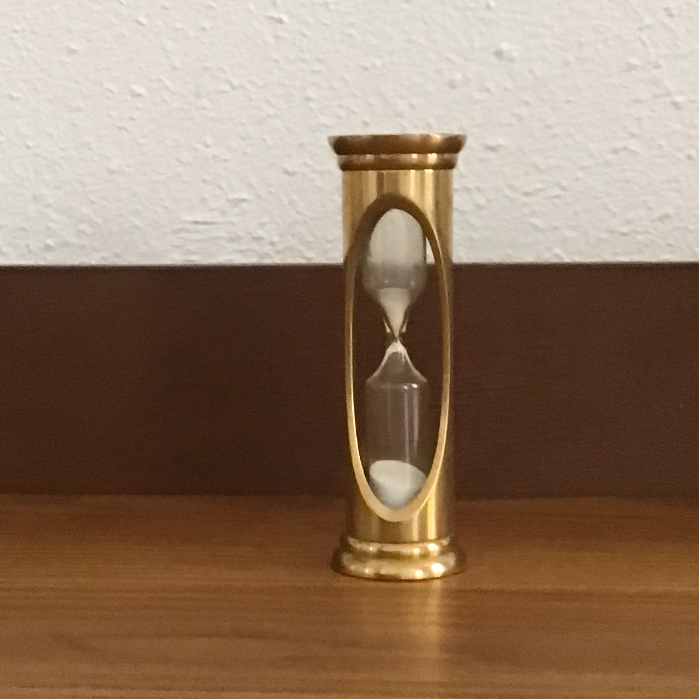 Old vintage golden hourglass