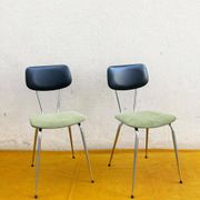 Pair of chrome metal, black leatherette and green velvet chairs, 1970s
