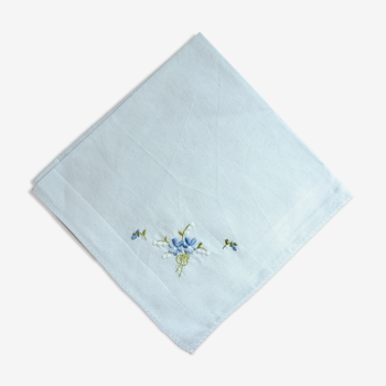 Square of hand-embroidered fabric forget-me-not