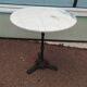 Bistro table in round marble of Parisian brasserie