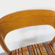 Vintage sled chair by Baumann in wood and wool fabric.
