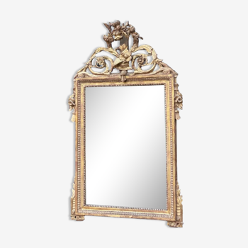 Miroir Louis XVI en bois sculpté et doré