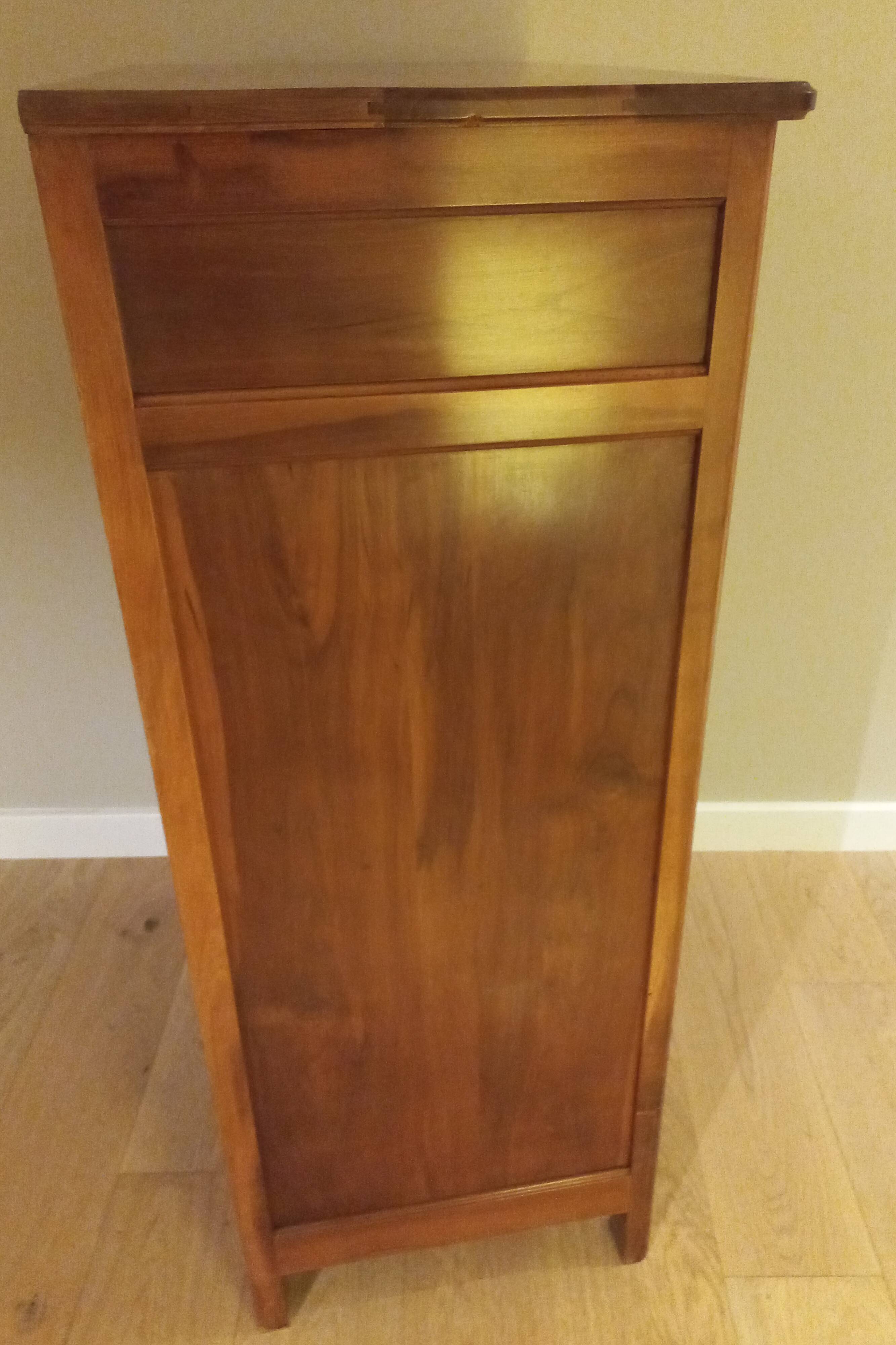 Small table and cherry wood sideboard.