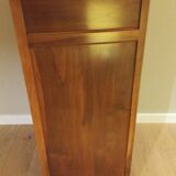 Small table and cherry wood sideboard.