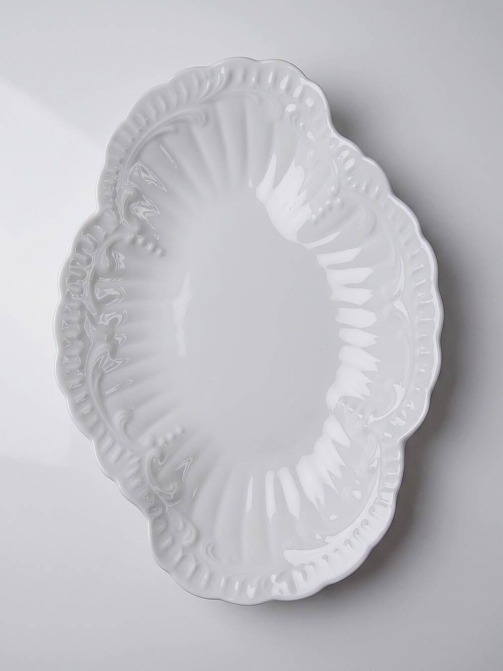 Vintage hollow plate Chastagner Limoges in white porcelain, rococo style.