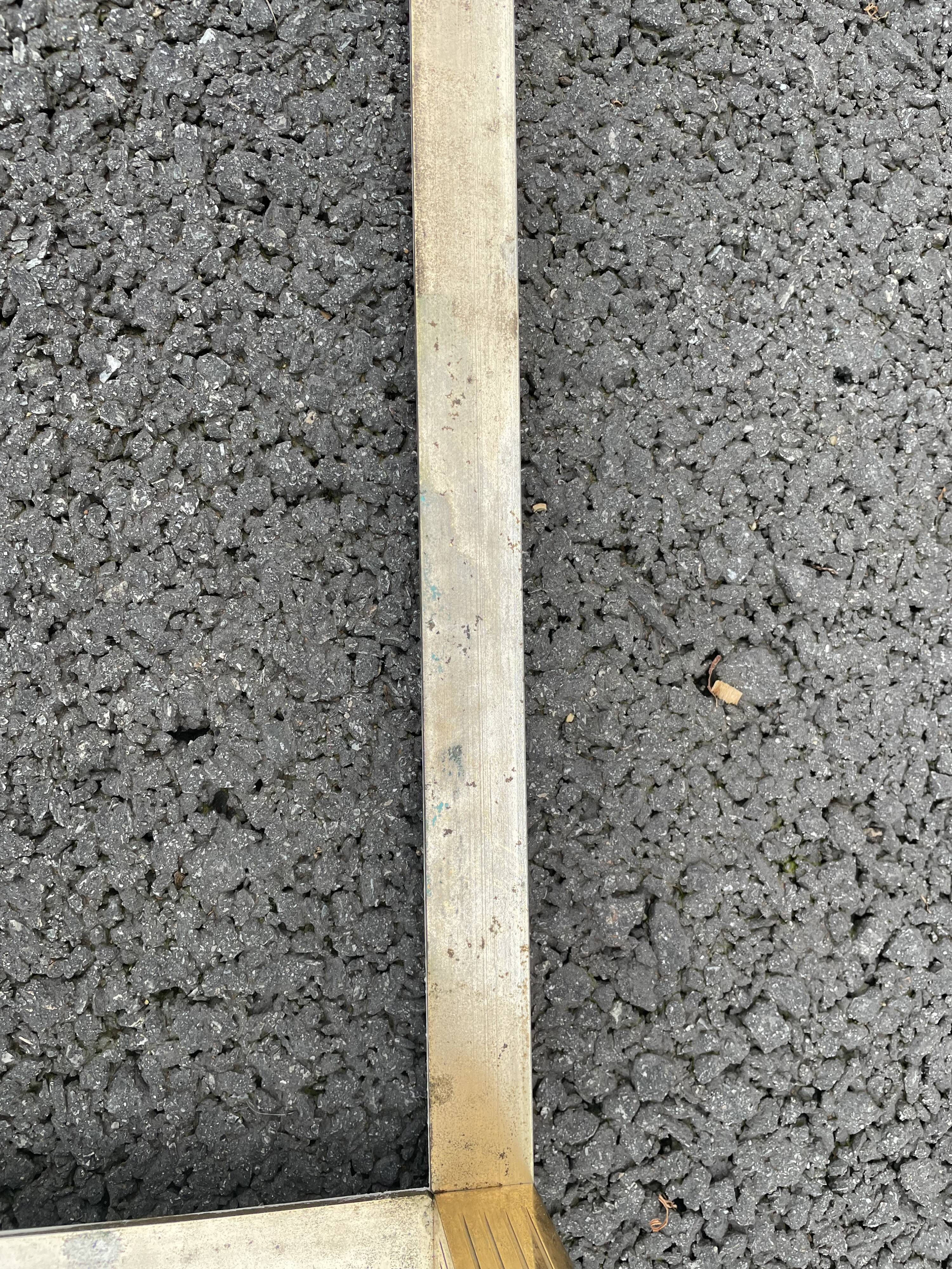 Coffee table in gilded brass and veined green marble