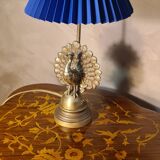 Art Nouveau style steel and brass peacock lamp, 40x22