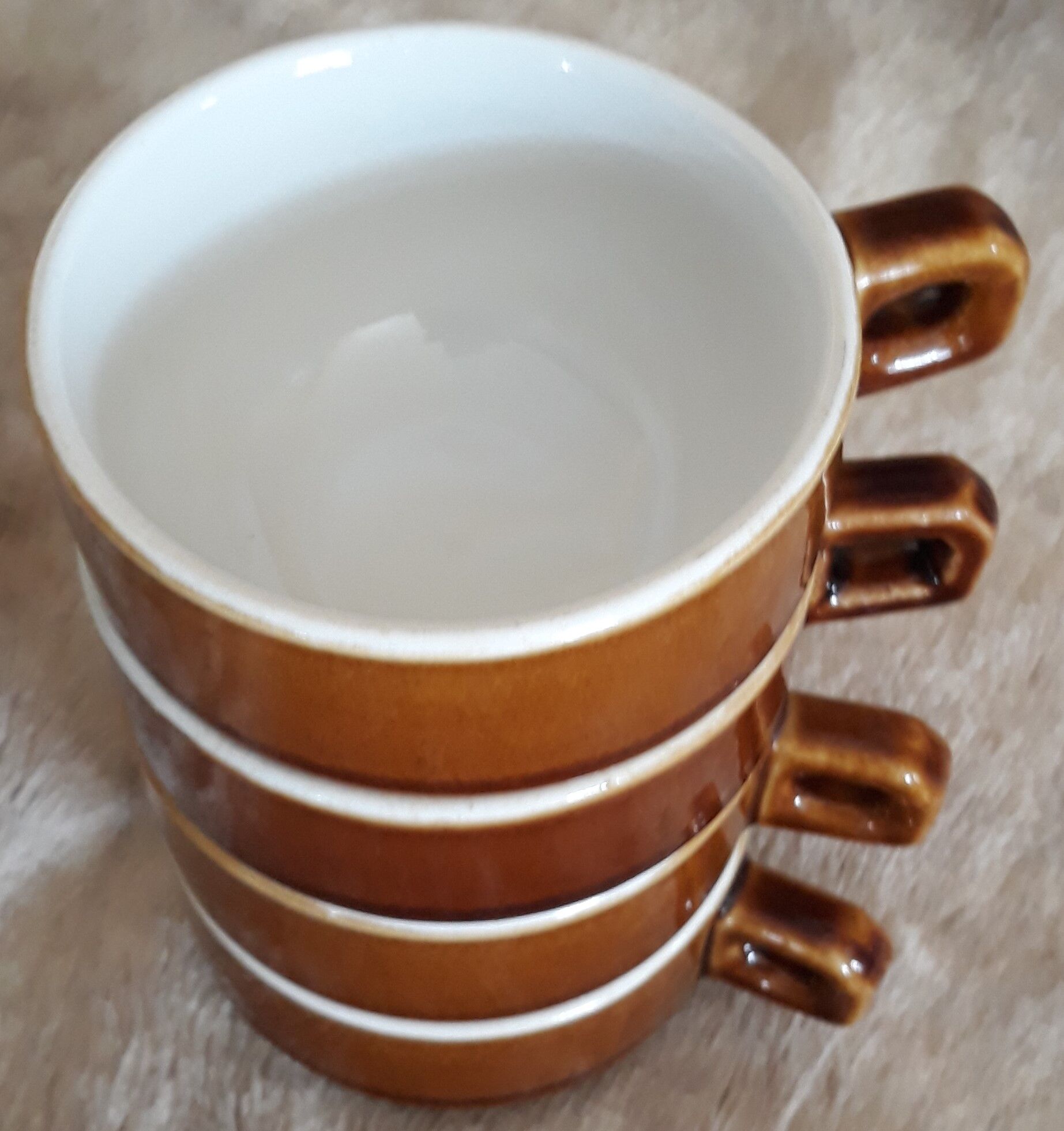 Old cups of coffee - brown ceramics typical of station buffets