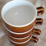 Old cups of coffee - brown ceramics typical of station buffets