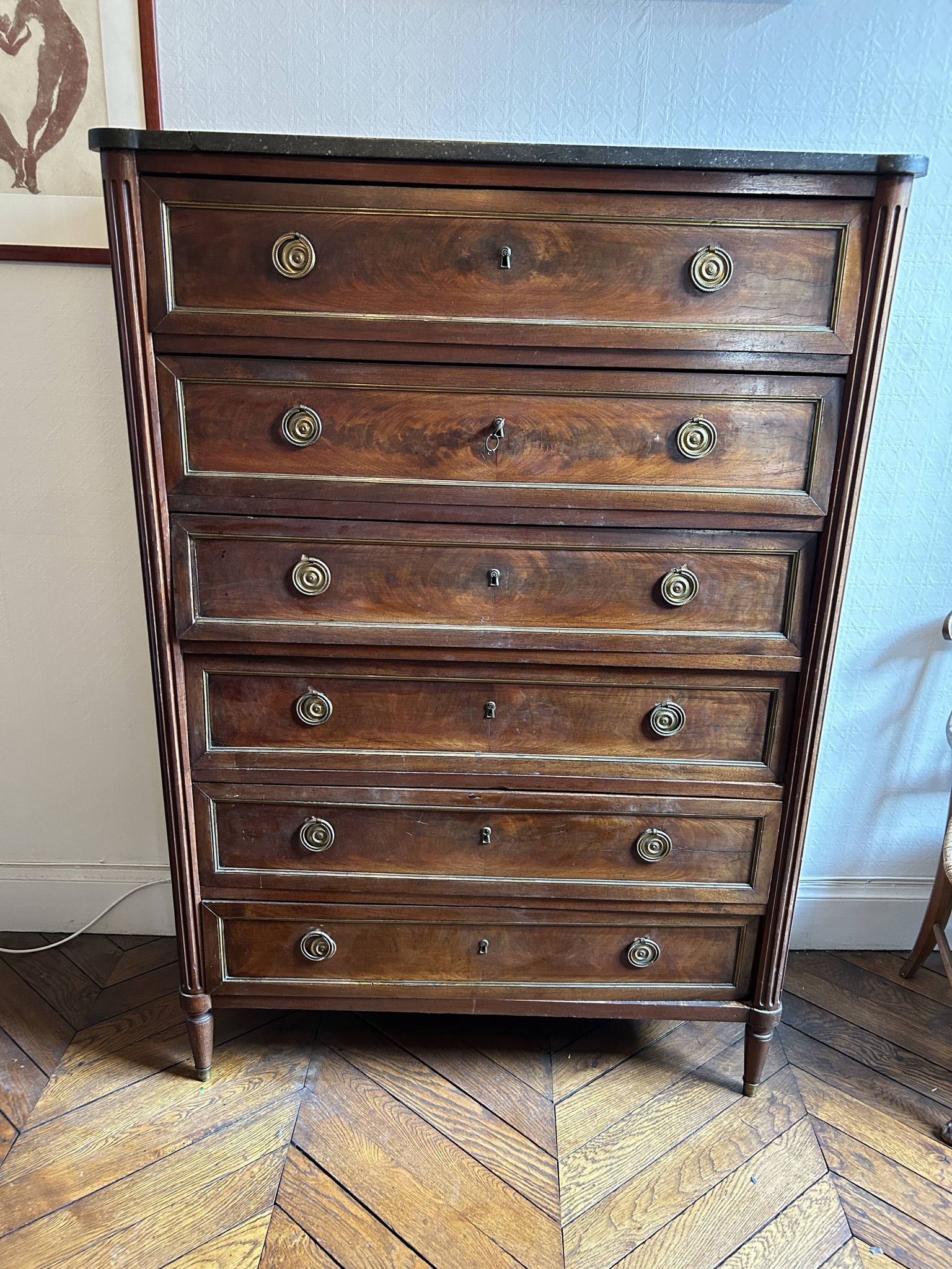 Mahogany and black marble chest of drawers, late 18th-early 19th century