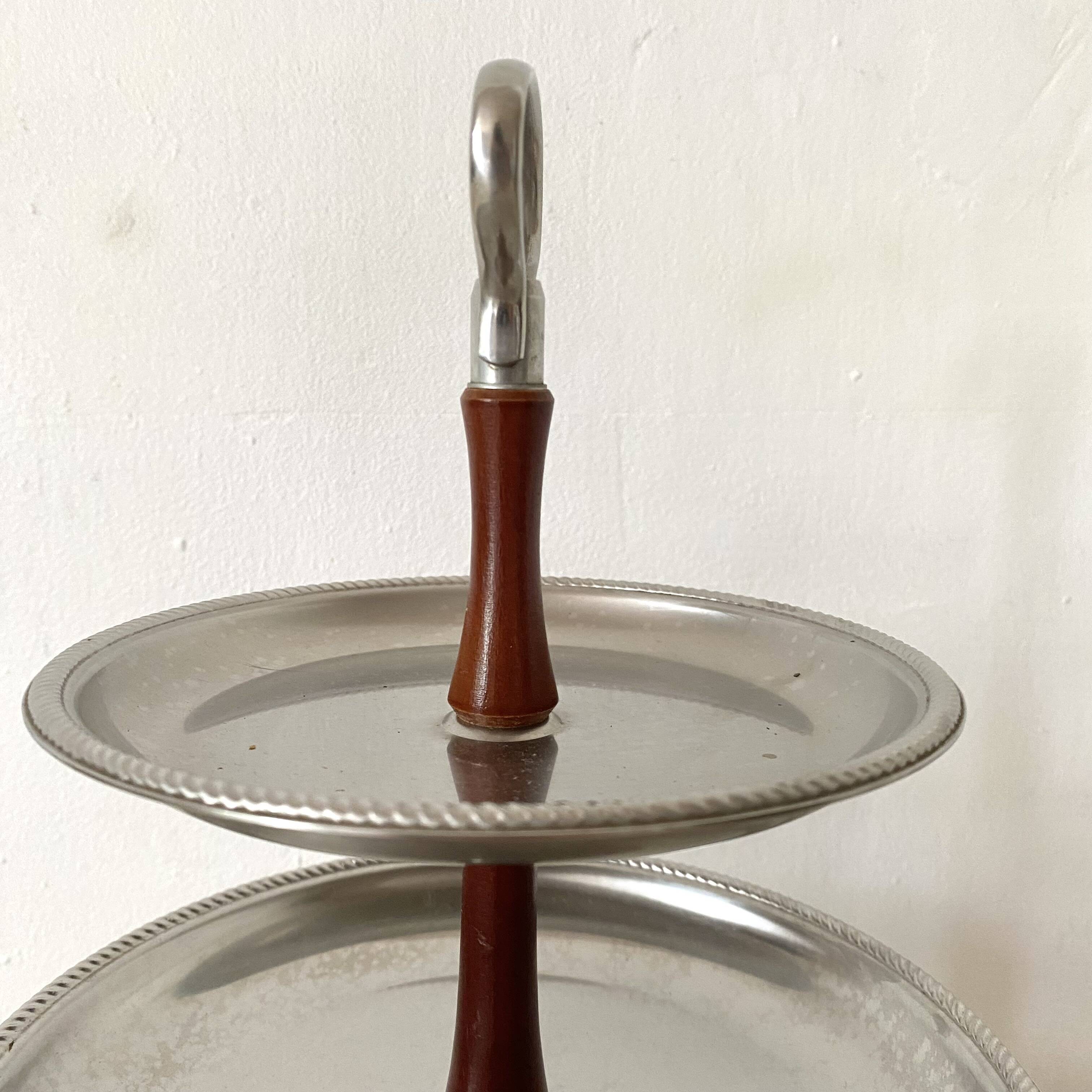 Vintage tiered display stand, stainless steel rotating server Alessi Fratelli