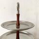 Vintage tiered display stand, stainless steel rotating server Alessi Fratelli
