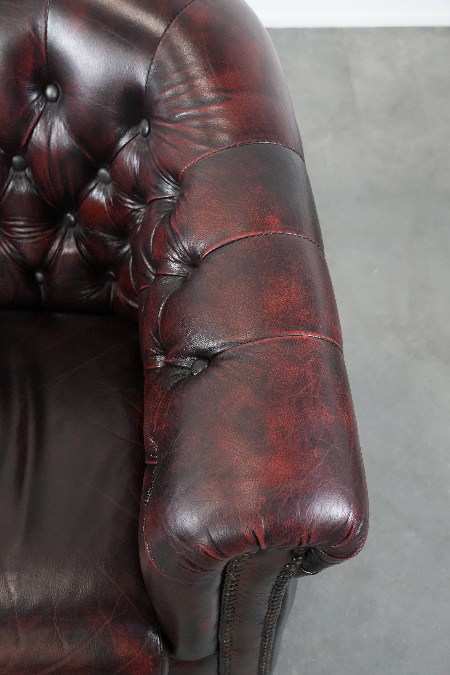 Cow leather Chesterfield club armchair in classic English style