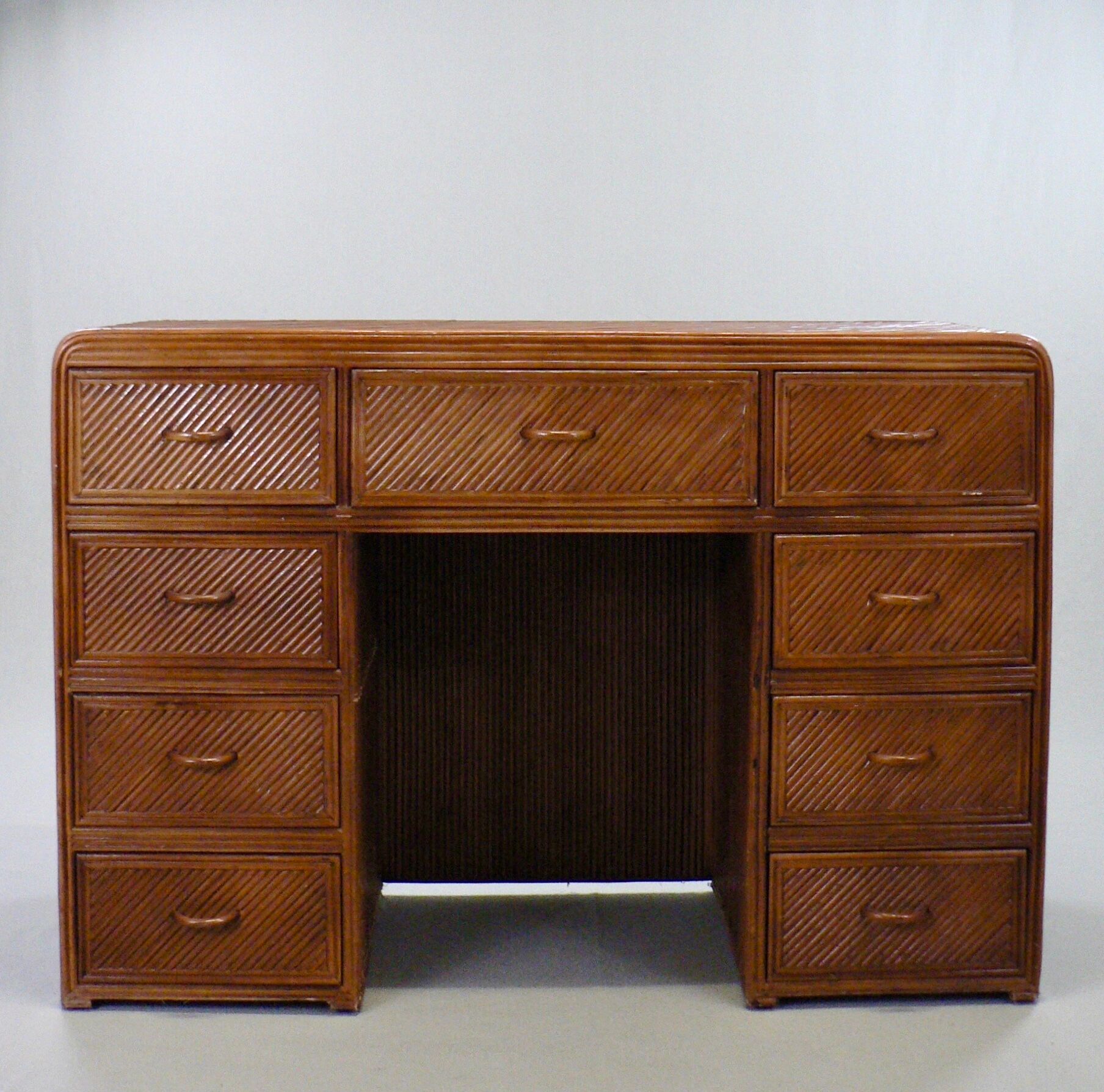 A console with split bamboo drawers