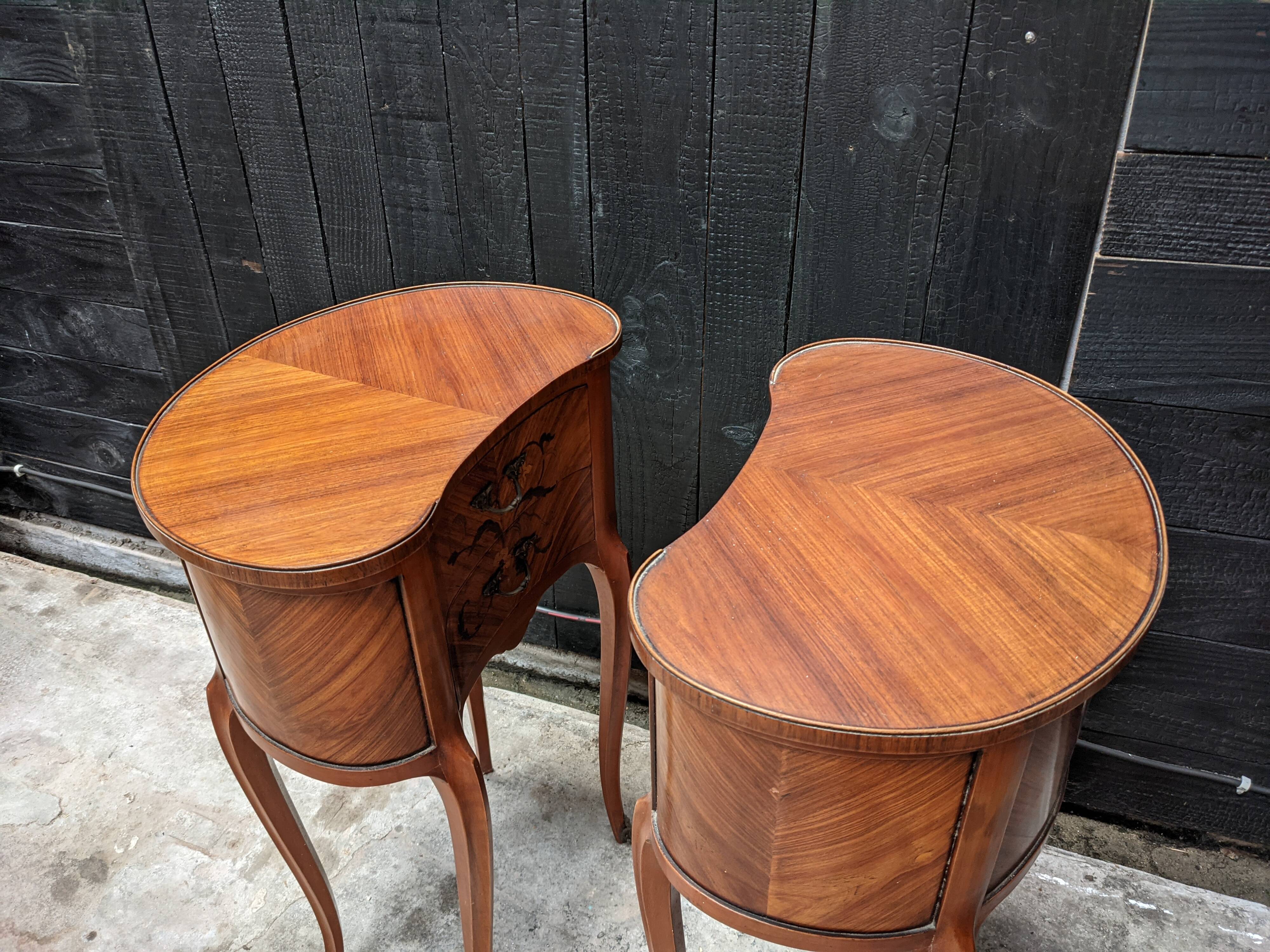 Pair of kidney bedside tables