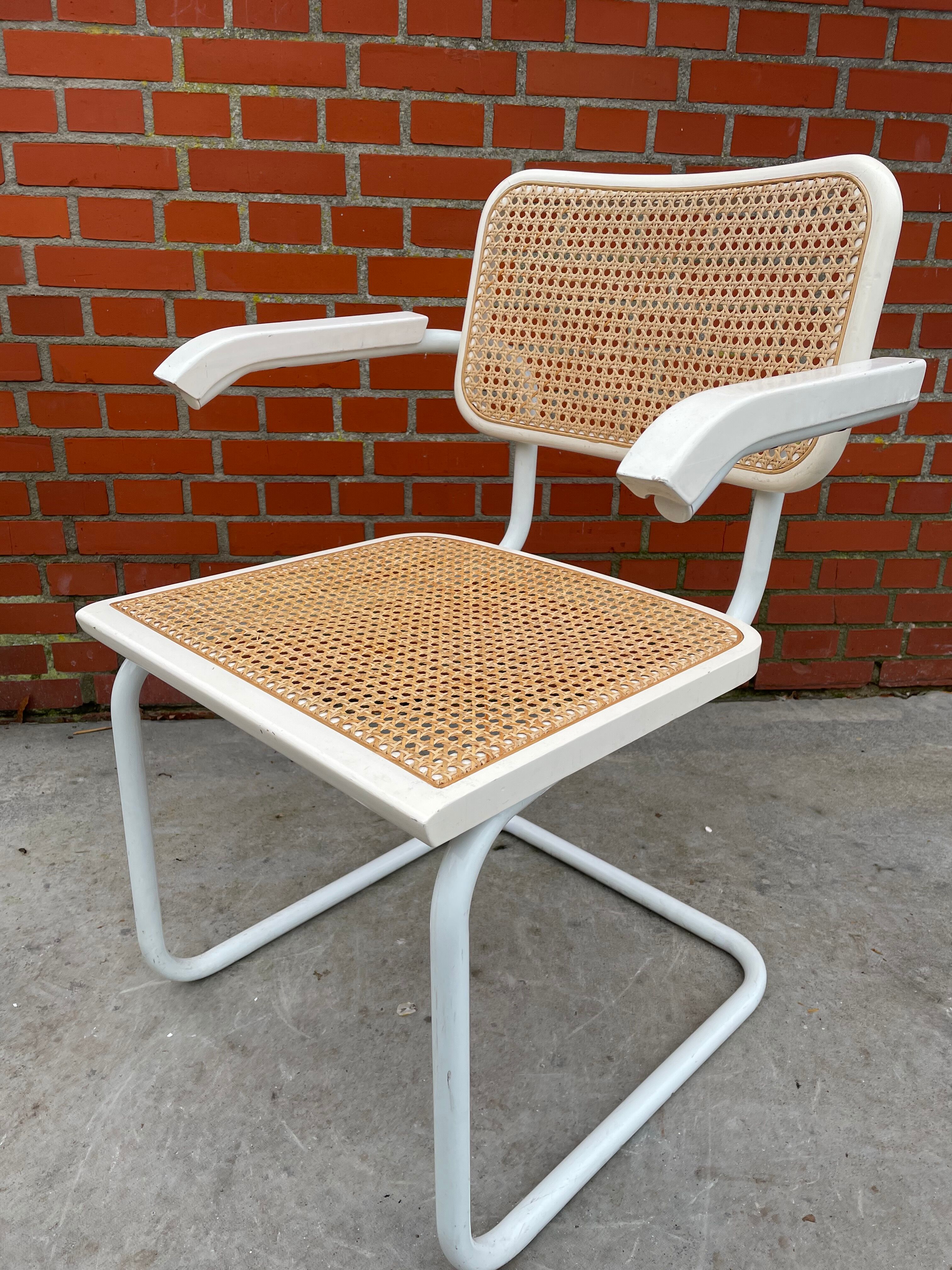 Cesca chair model with armrest in white