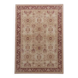 Beige and red oriental rug in wool.