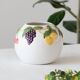 Vase boule vintage en relief barbotine fruits