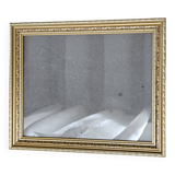 Golden wooden frame with floral patterns