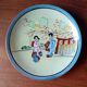 Vintage Japanese fine porcelain tea set with landscape pattern.
