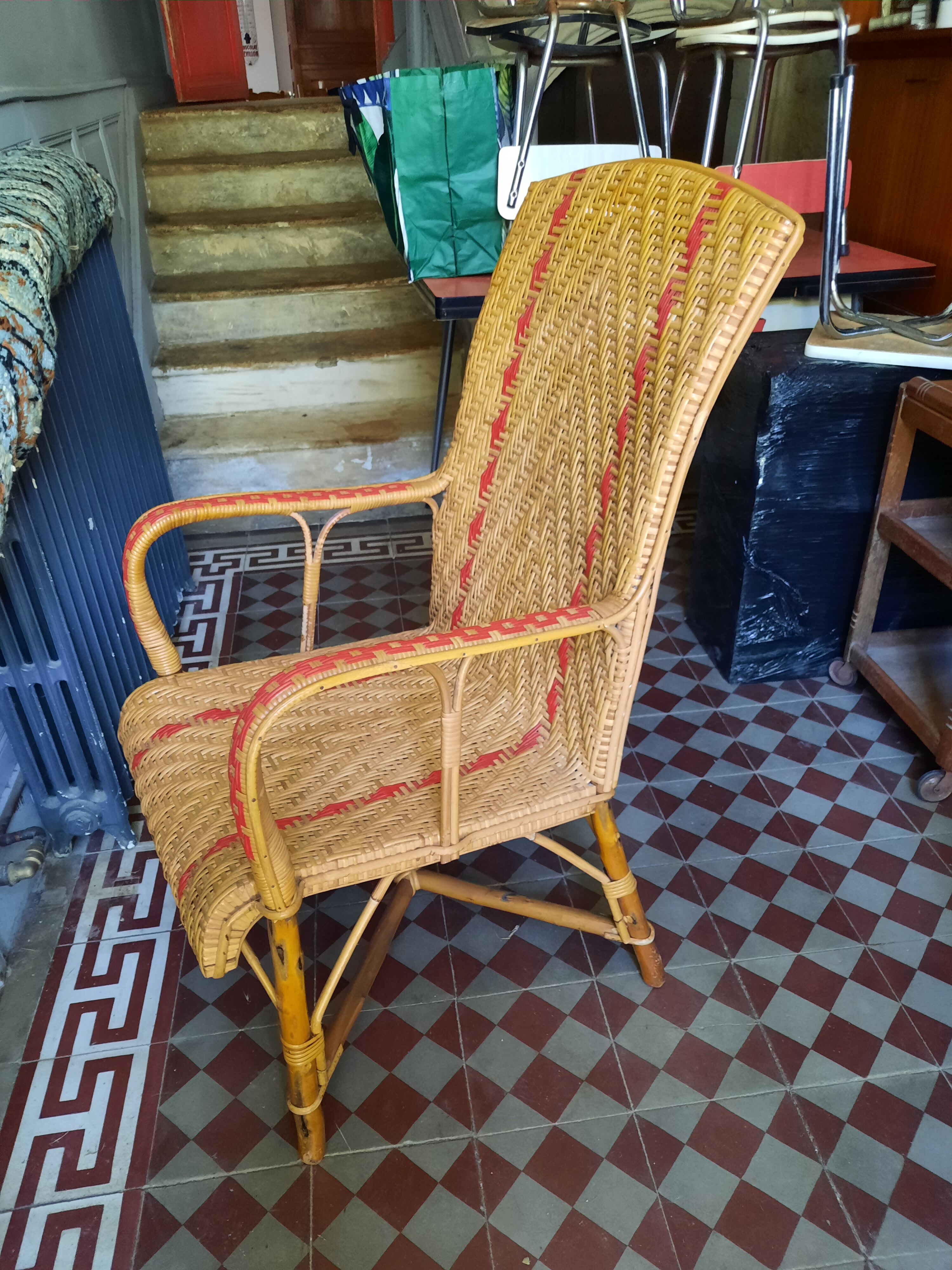 Braided rattan armchair