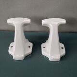 Pair of art deco porcelain coat racks