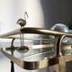 Vintage rolling golden and black dessert in brass and glass