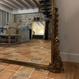 Large gilded mirror with pediment